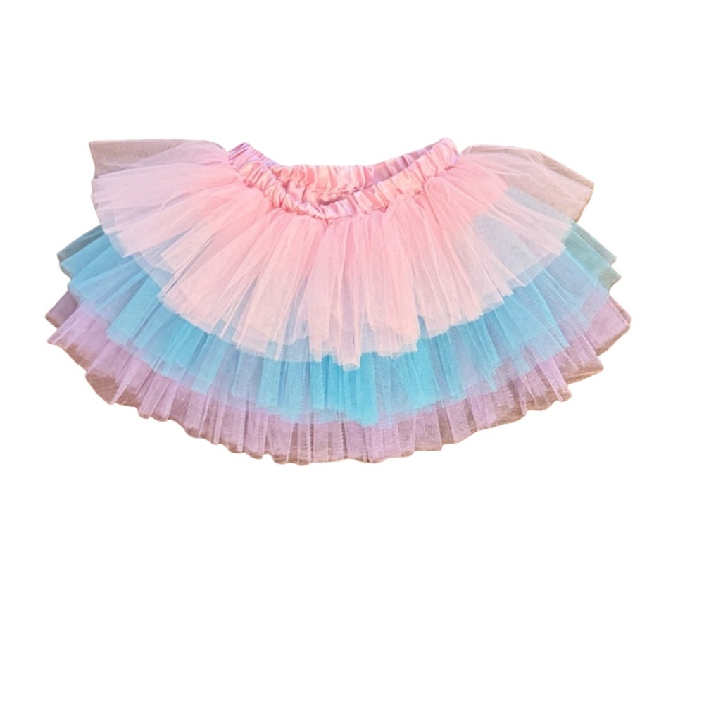 Baby tutu in pink, purple and blue. Great condition and super soft.